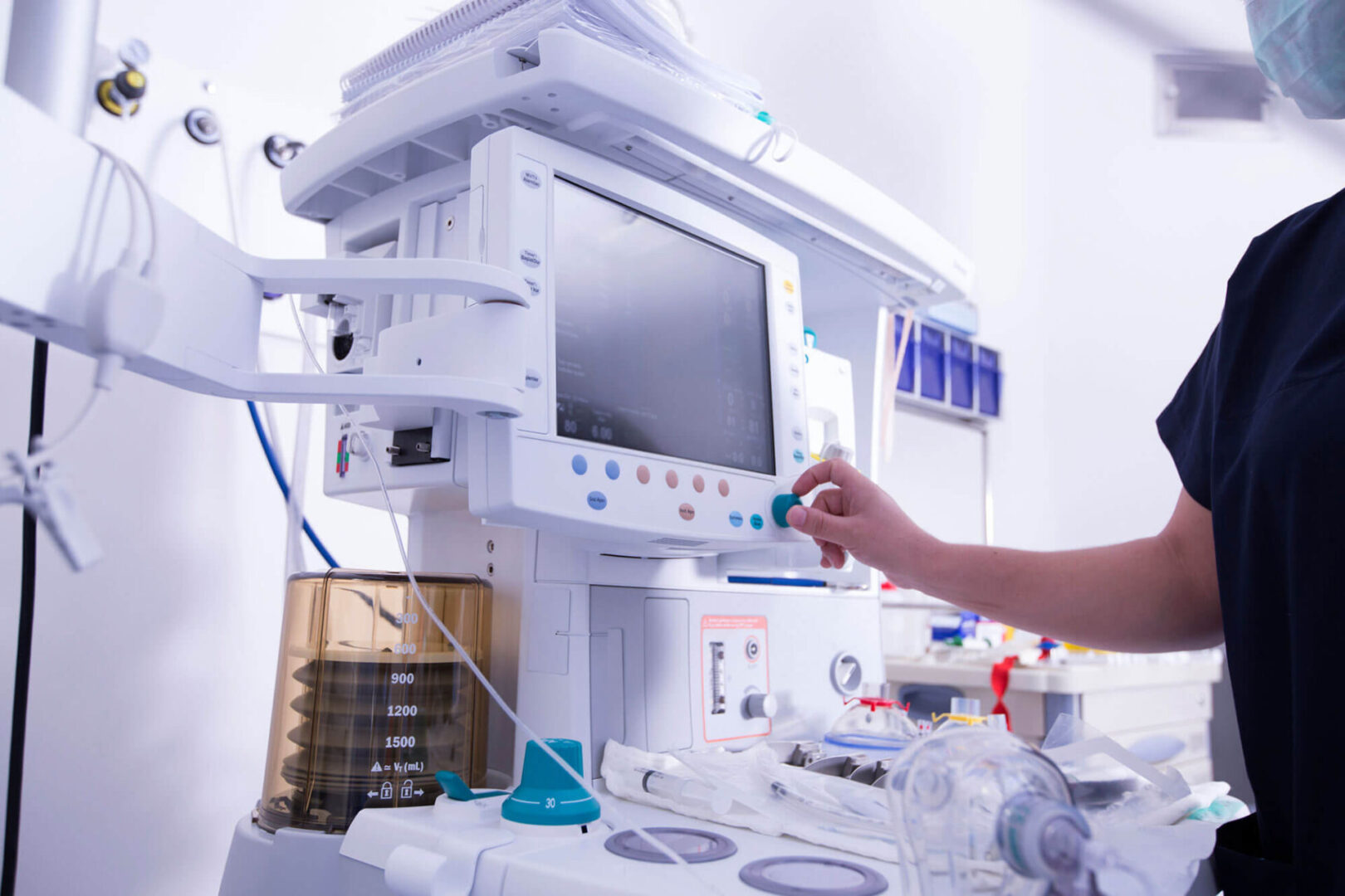 GettyImages-532850089-copy A person is operating an electronic device in a room.