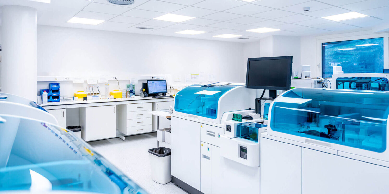 GettyImages-1924477578-copy A lab with many machines and some tables